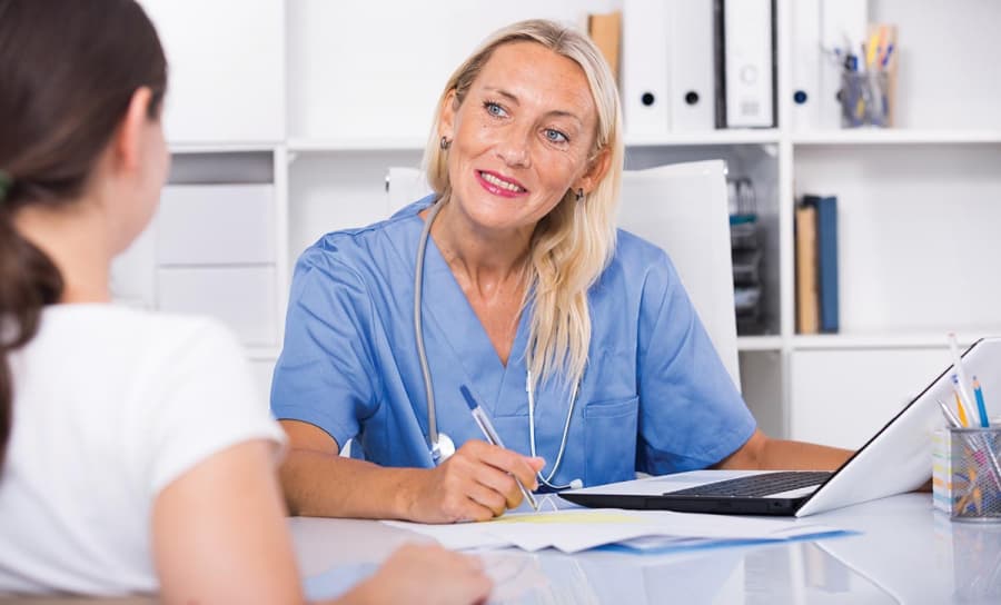 woman-physician-consulting-female-office.jpg